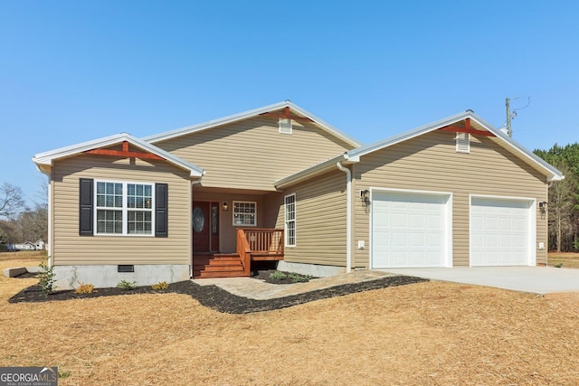 view of front of home featuring an attached garage and driveway