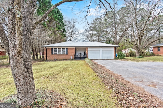 ranch-style house featuring aphalt driveway, an attached garage, brick siding, crawl space, and a front lawn