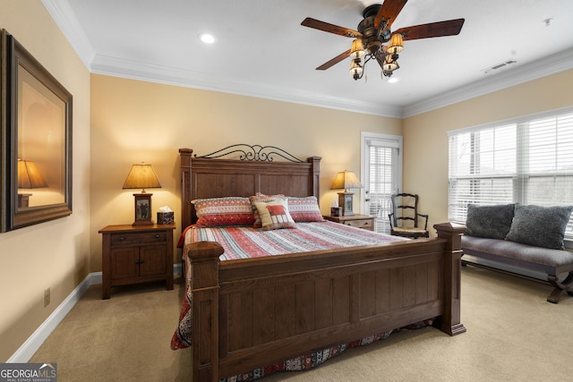 bedroom featuring crown molding, light colored carpet, visible vents, ceiling fan, and baseboards