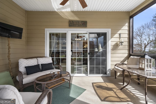 exterior space featuring a ceiling fan and outdoor lounge area