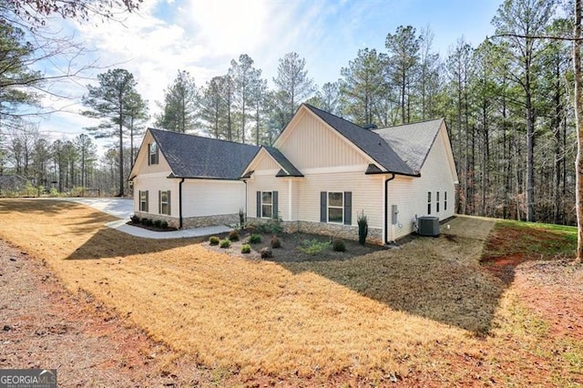 1312 Mcgarity Rd, Temple, GA 30179 - view of front of home with stone siding and central AC