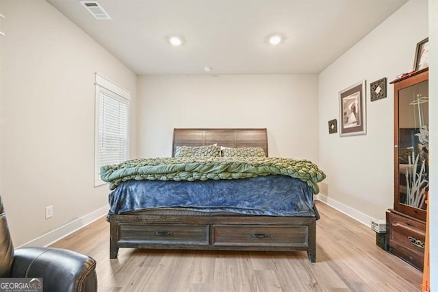 1312 Mcgarity Rd, Temple, GA 30179 - bedroom featuring light wood-style flooring, baseboards, and recessed lighting