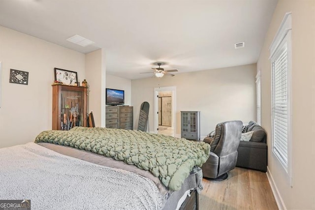 1312 Mcgarity Rd, Temple, GA 30179 - bedroom featuring wood finished floors, baseboards, and ceiling fan