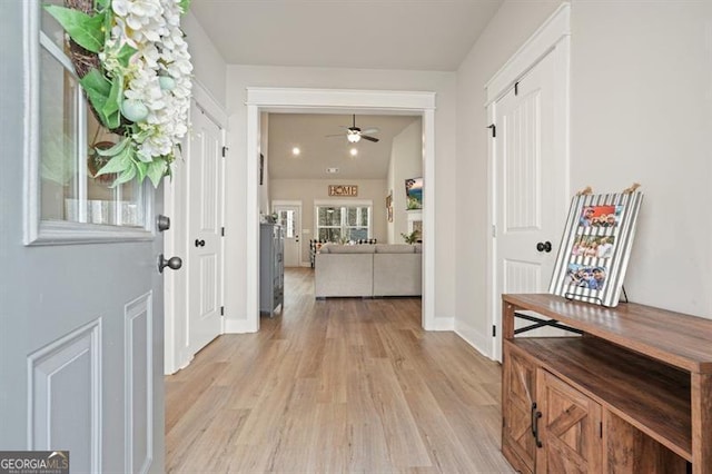 1312 Mcgarity Rd, Temple, GA 30179 - entryway with a ceiling fan, light wood-style flooring, and baseboards