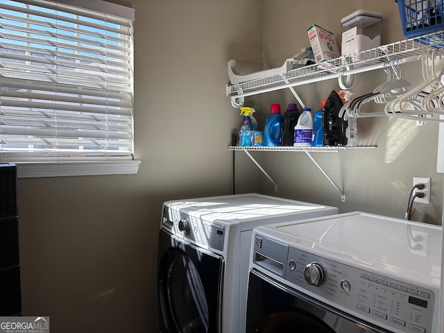 laundry area featuring laundry area and independent washer and dryer