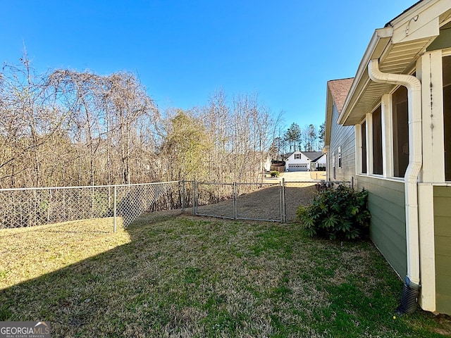 view of yard with a fenced backyard