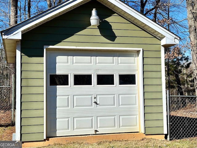 garage featuring fence