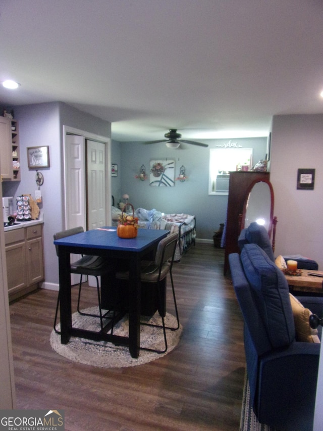 dining area featuring dark wood-style floors, baseboards, a ceiling fan, and recessed lighting