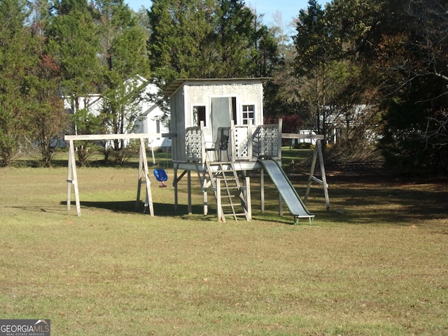 view of playground with a yard