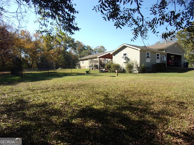 view of yard featuring fence