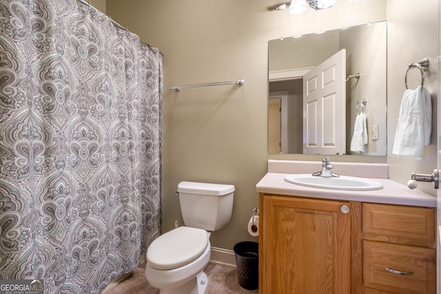 bathroom with toilet, tile patterned flooring, a shower with shower curtain, and vanity