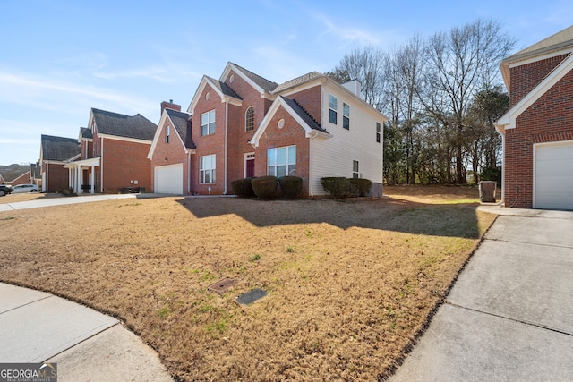 view of property exterior featuring driveway, a yard, and brick siding