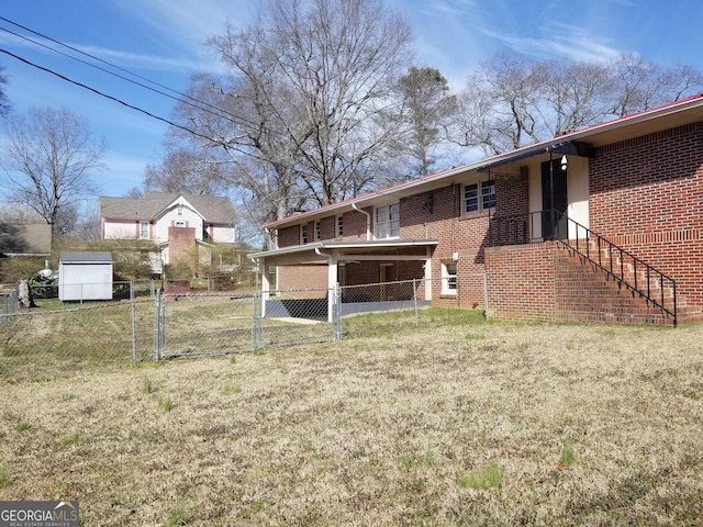 view of yard featuring a gate and fence