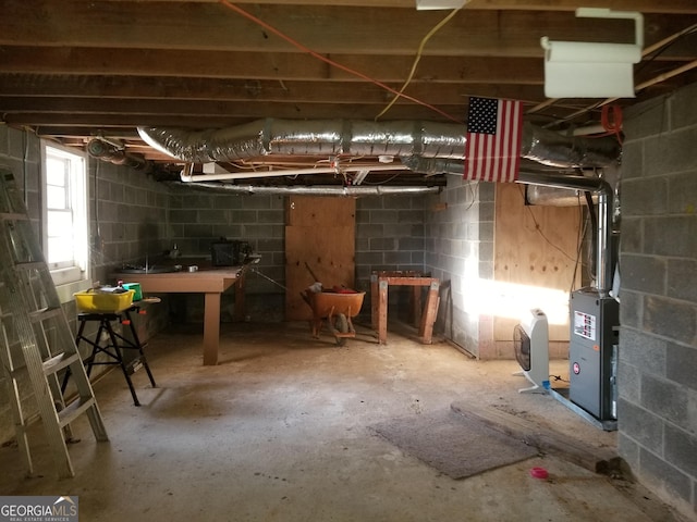 basement featuring concrete block wall