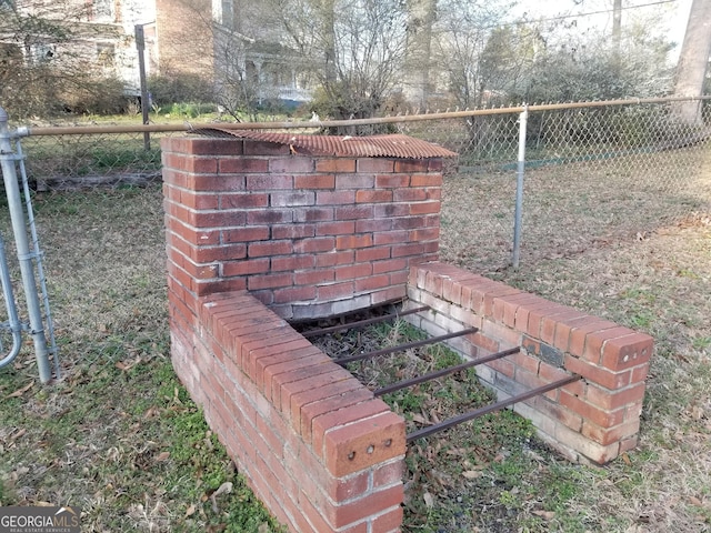 exterior details featuring fence