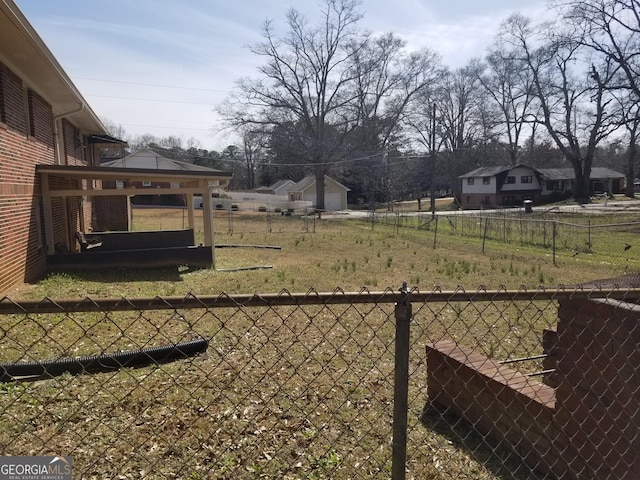 view of yard featuring fence
