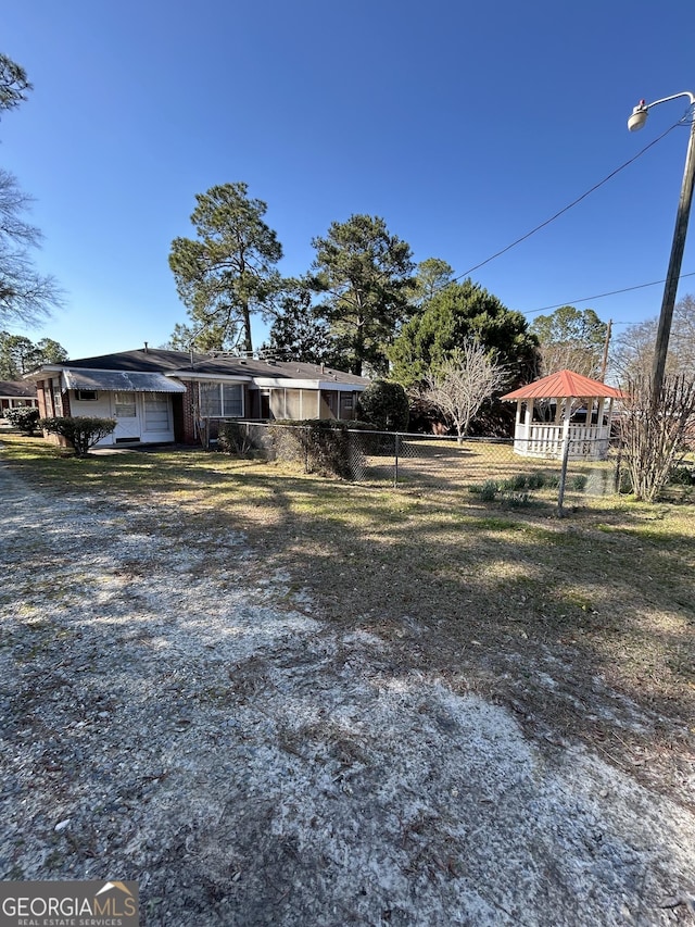 view of front of property with fence