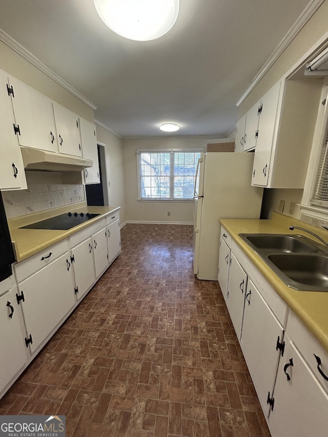 kitchen with white cabinetry, a sink, under cabinet range hood, and black electric cooktop