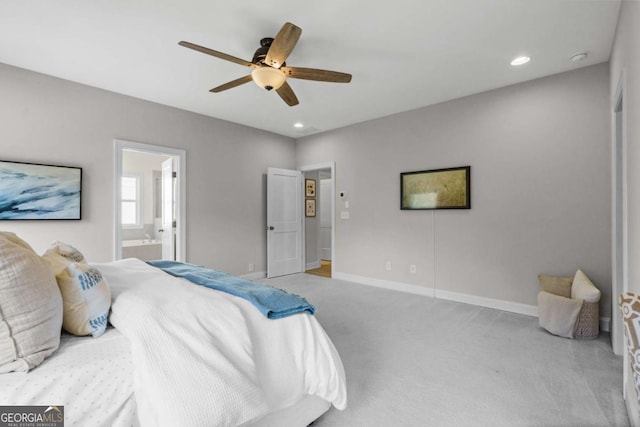 bedroom with connected bathroom, recessed lighting, a ceiling fan, baseboards, and carpet