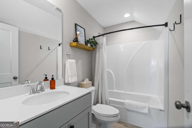 bathroom with shower / tub combo, visible vents, vanity, and toilet