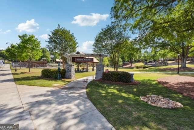 view of community featuring a yard