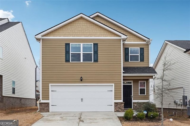 craftsman inspired home with brick siding, driveway, and an attached garage