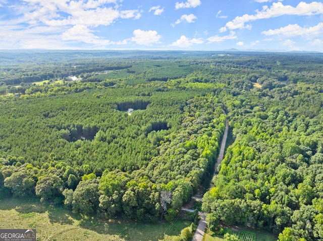 bird's eye view featuring a view of trees