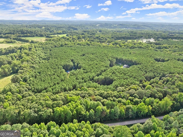 bird's eye view featuring a view of trees