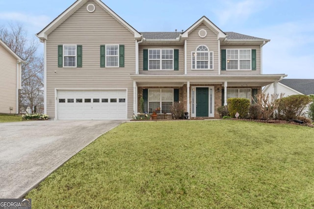 view of front of home featuring covered porch, driveway, a front lawn, and an attached garage