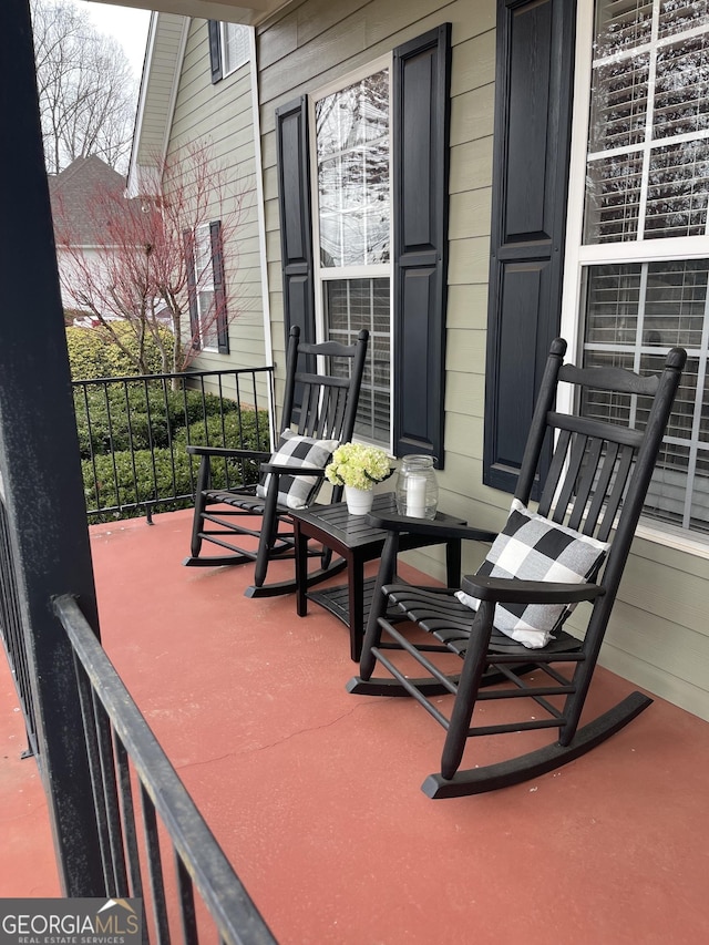 view of patio featuring a porch