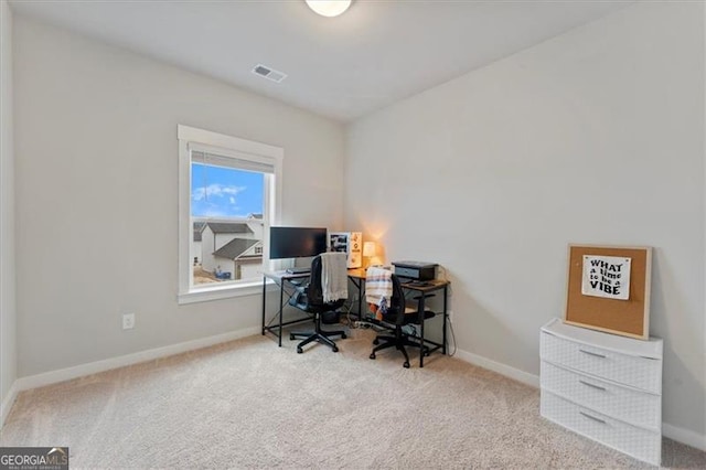 home office with baseboards, visible vents, and carpet flooring