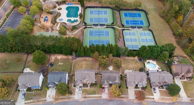 birds eye view of property with a residential view