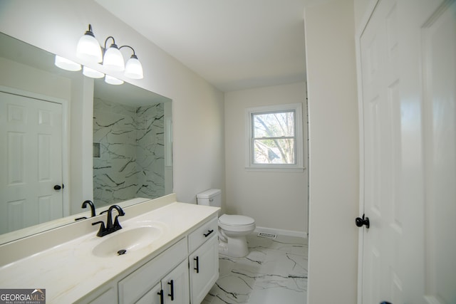 bathroom featuring vanity, baseboards, walk in shower, toilet, and marble finish floor