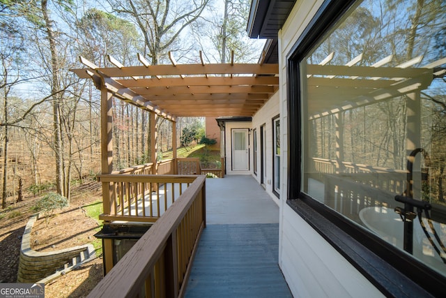 deck featuring a pergola