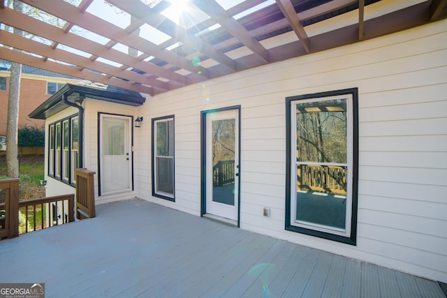 wooden deck with a pergola