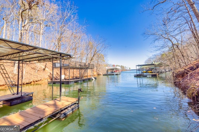 dock area featuring a water view