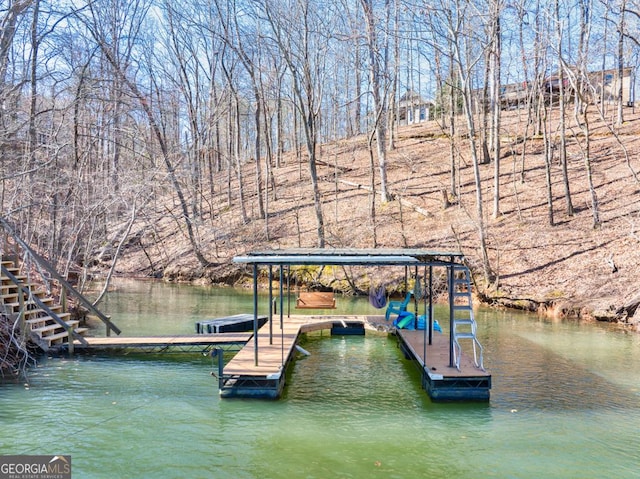 view of dock with a water view