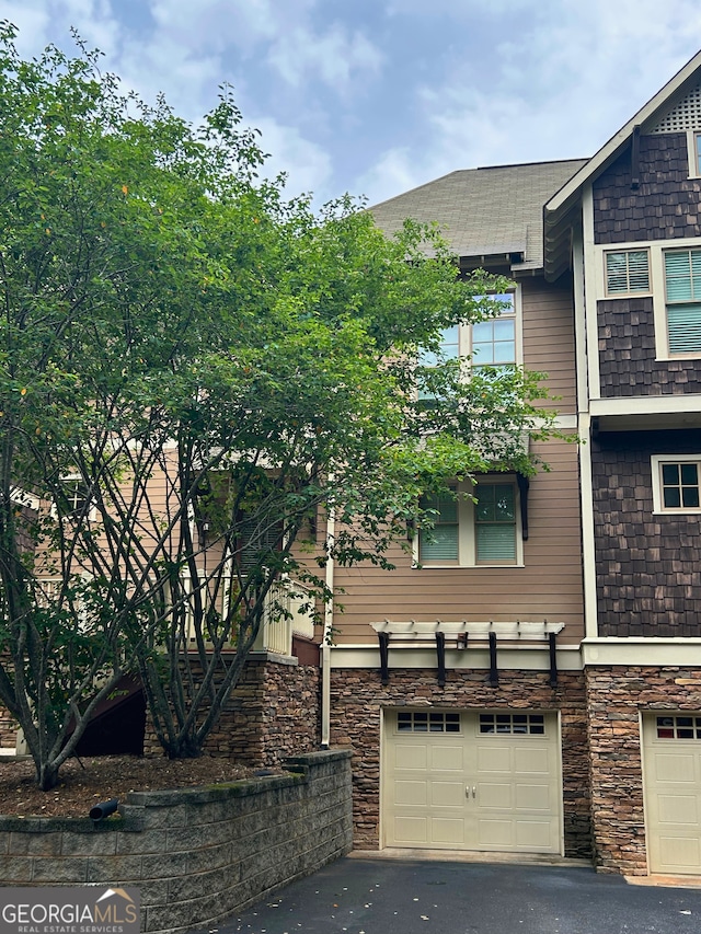 310 Research Dr Unit 303, Athens, GA 30605 - view of property with a garage and driveway