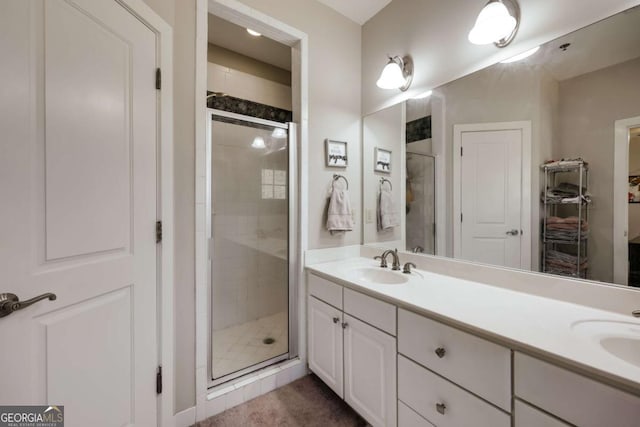 310 Research Dr Unit 303, Athens, GA 30605 - bathroom featuring a shower stall and double vanity