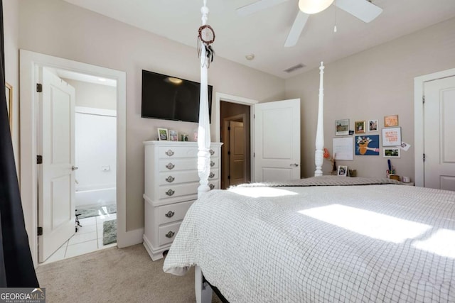 310 Research Dr Unit 303, Athens, GA 30605 - bedroom with light colored carpet, ensuite bath, and a ceiling fan