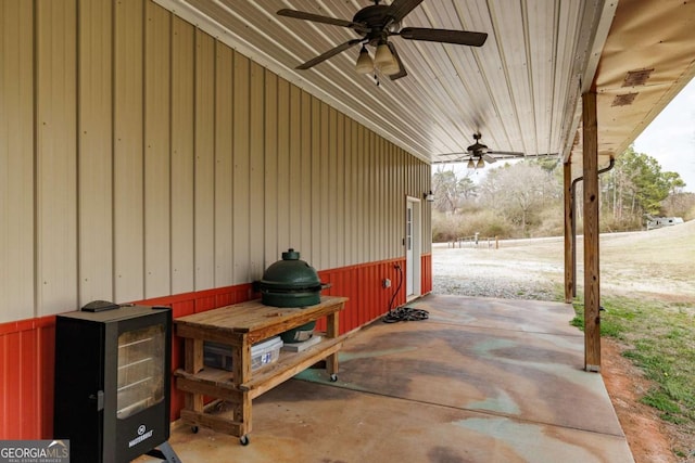 view of patio featuring ceiling fan