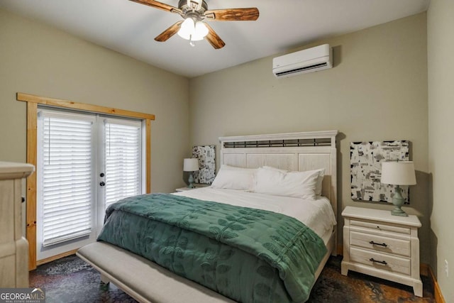 bedroom featuring access to exterior, a wall unit AC, baseboards, and a ceiling fan