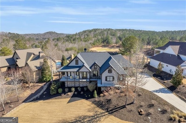 drone / aerial view with a forest view