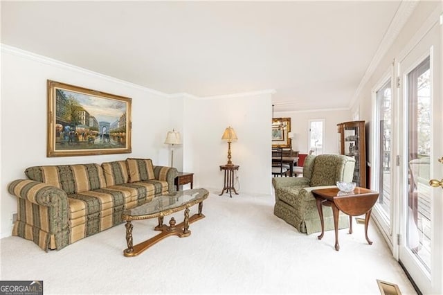 living room with light carpet, visible vents, and ornamental molding