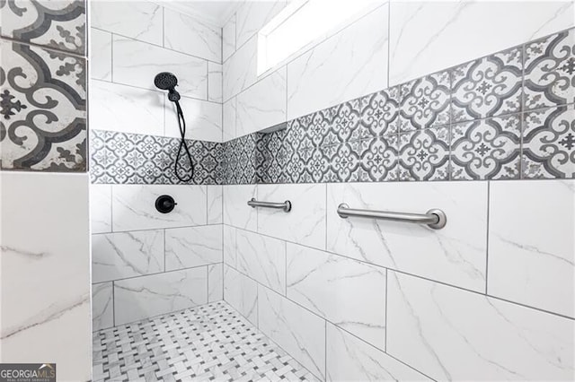 full bath featuring tiled shower