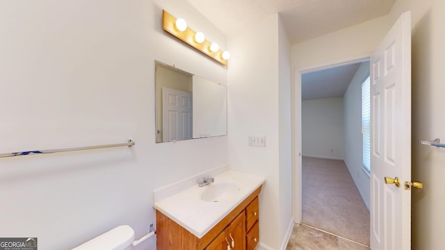 half bath with toilet and vanity