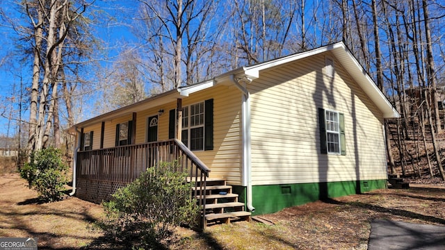 exterior space featuring a porch and crawl space