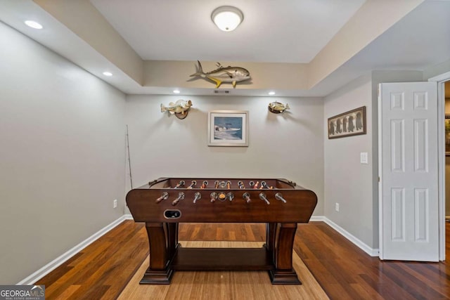 game room with recessed lighting, wood finished floors, and baseboards