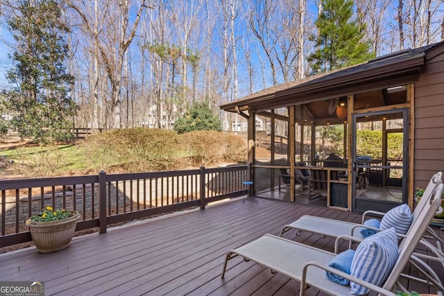 deck featuring a sunroom