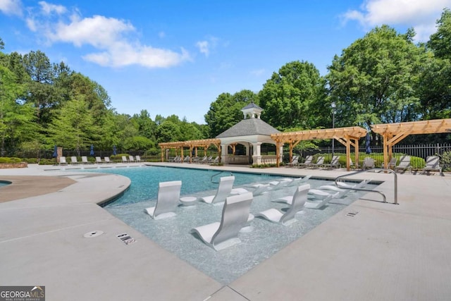 pool featuring a patio area, fence, and a pergola